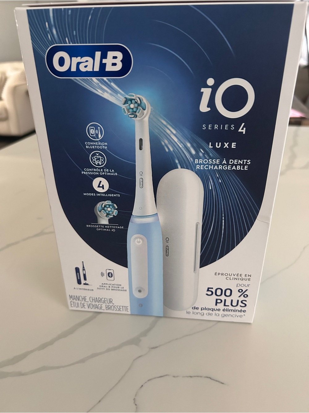 Oral-B iO Series 4 Luxe Rechargeable Electric Toothbrush — Light Blue